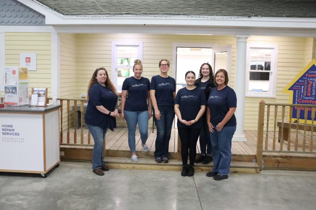 Intandem Credit Union team volunteering with Home Repair Services during a community involvement project